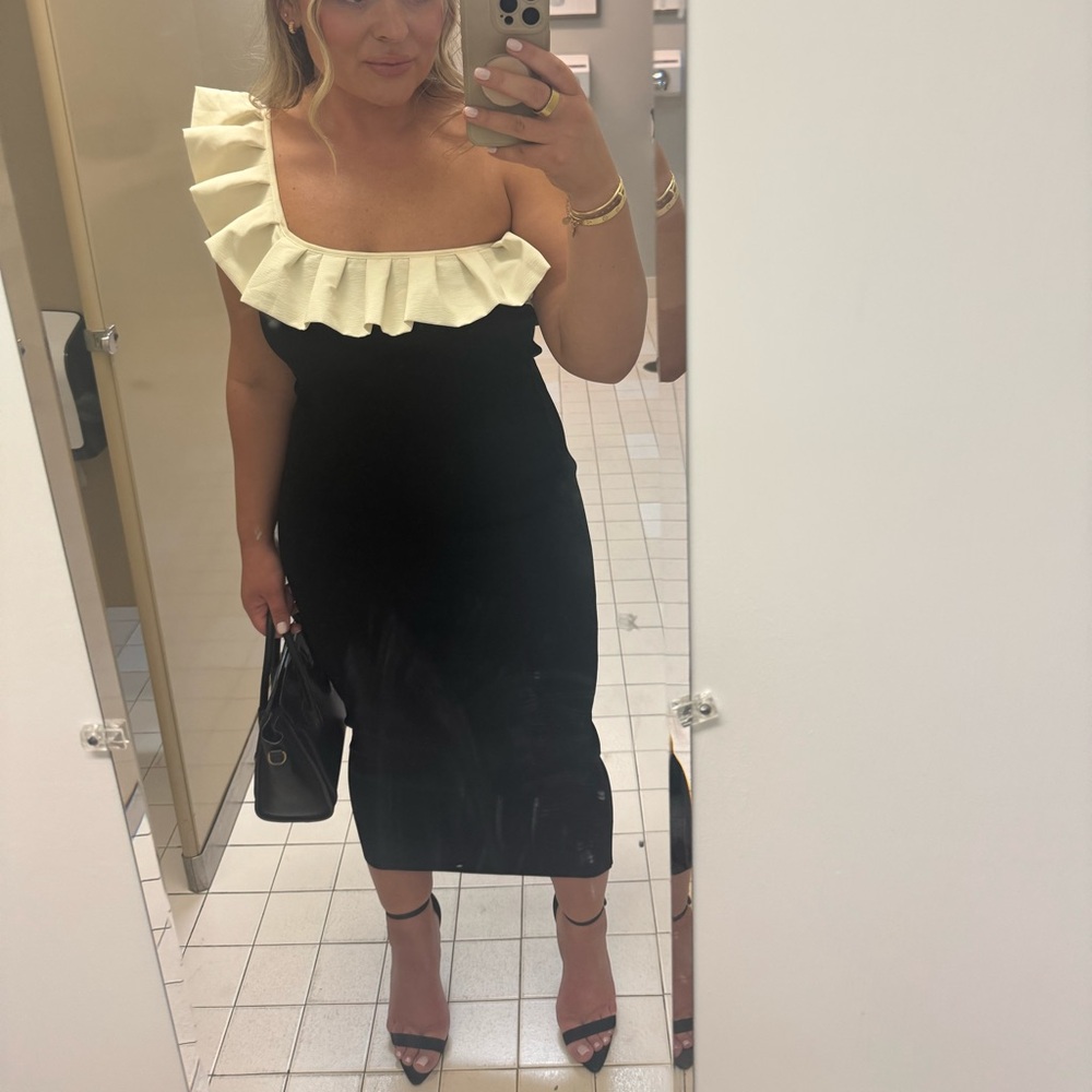 Elegant Black and Cream Ruffle Dress